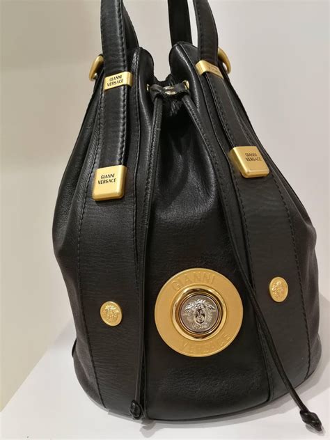 gianni versace handbags price.